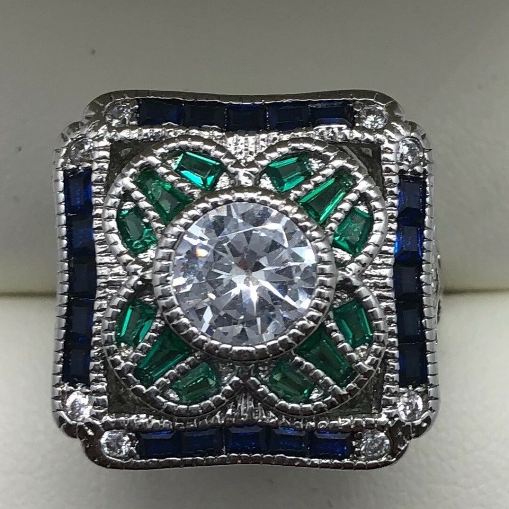 Ladies Fashion CZ, Emerald and Sapphire Ring with Pierced Scrollwork Sides sz 6